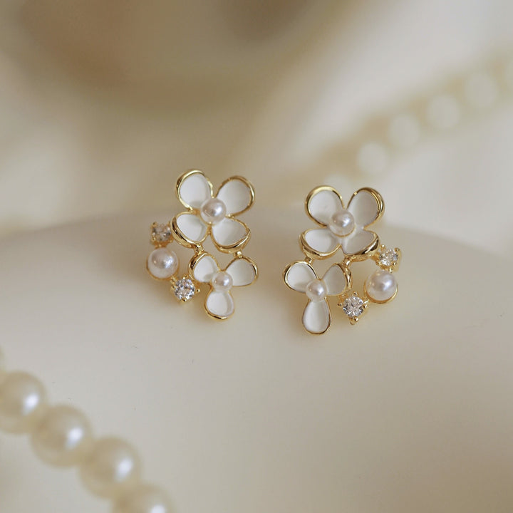 White Flower Clip on Earrings